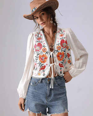 Broderad blus med blommor