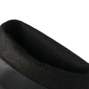 Cowboyboots med elegant broderi och glansig yta