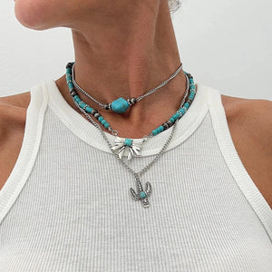 Flerradigt halsbandsset i western stil med turkoskors och choker