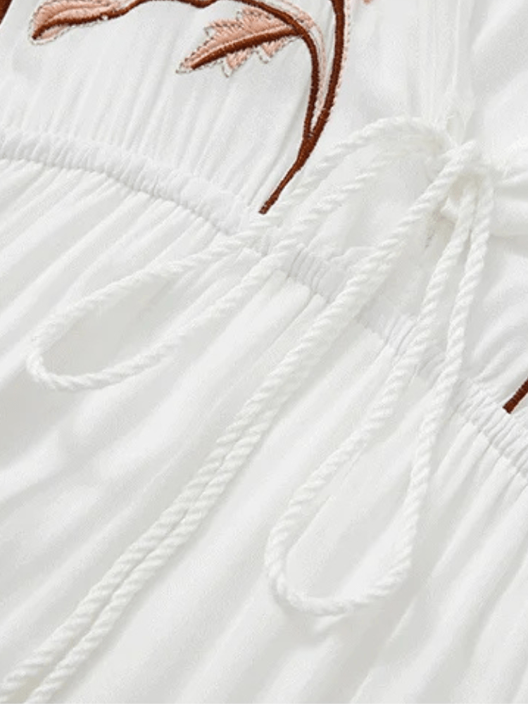 Broderad klänning