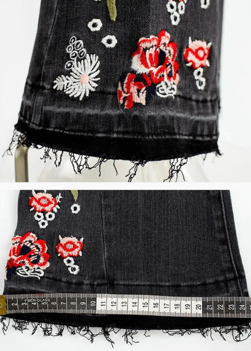 Broderade svarta flare jeans med blommönster
