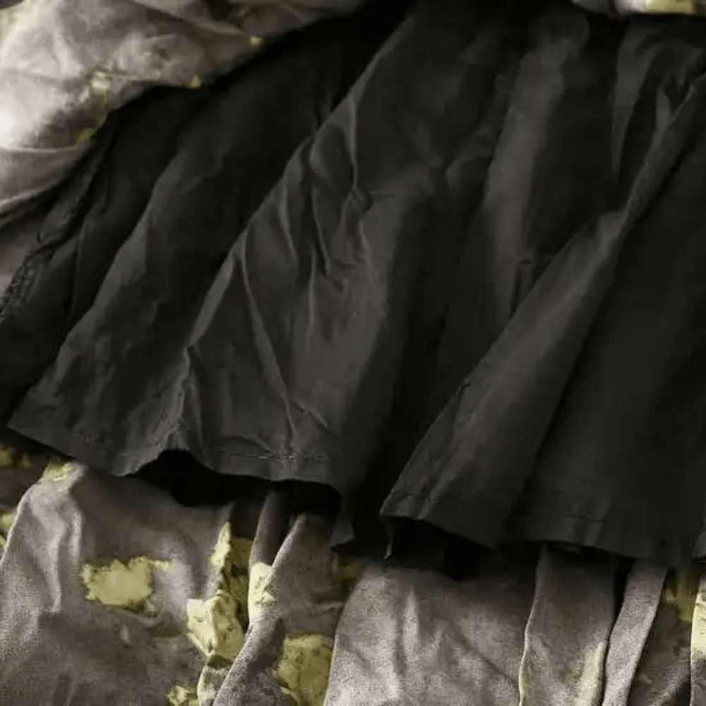 Lång plisserad kjol med blommönster
