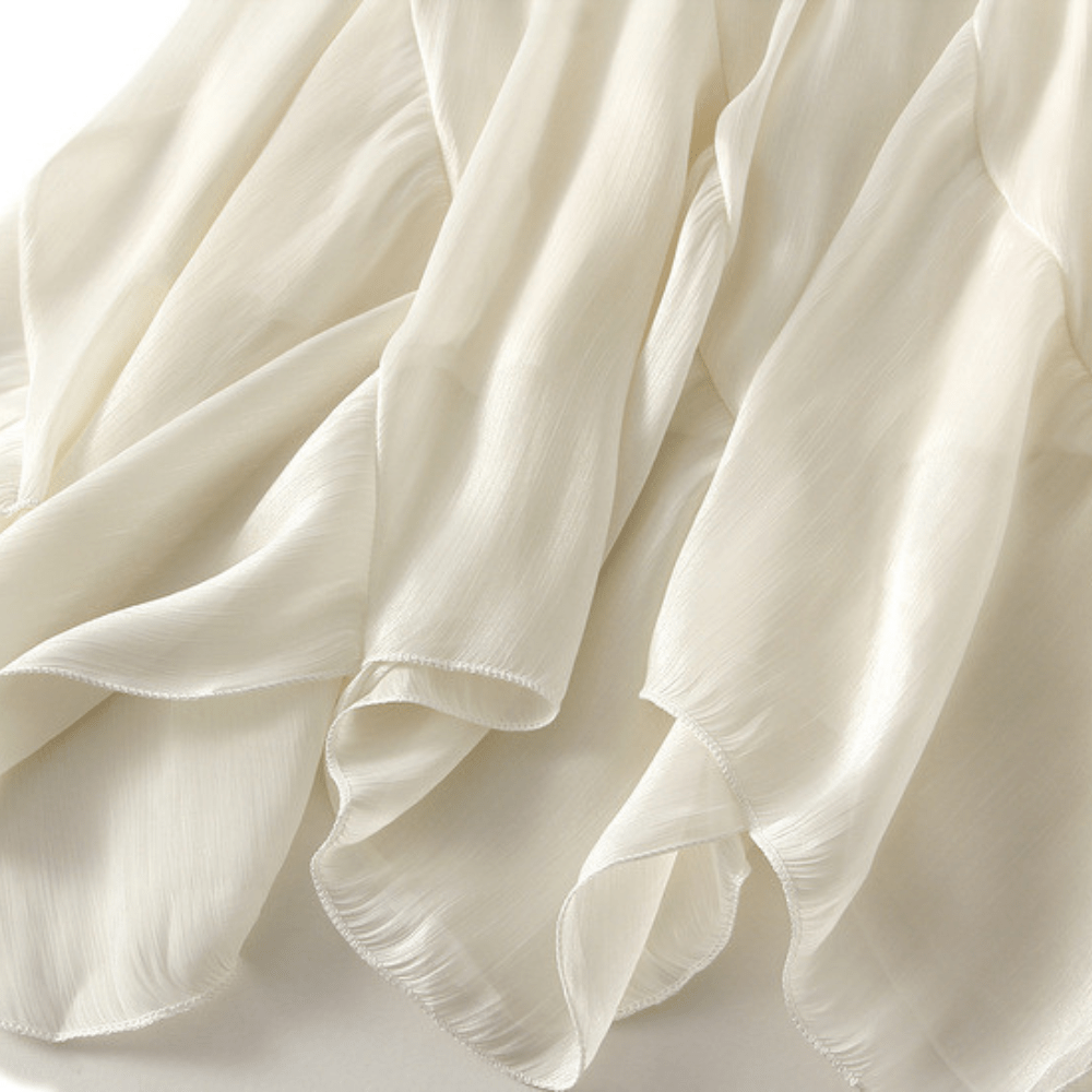 Midikjol med asymmetrisk drapering