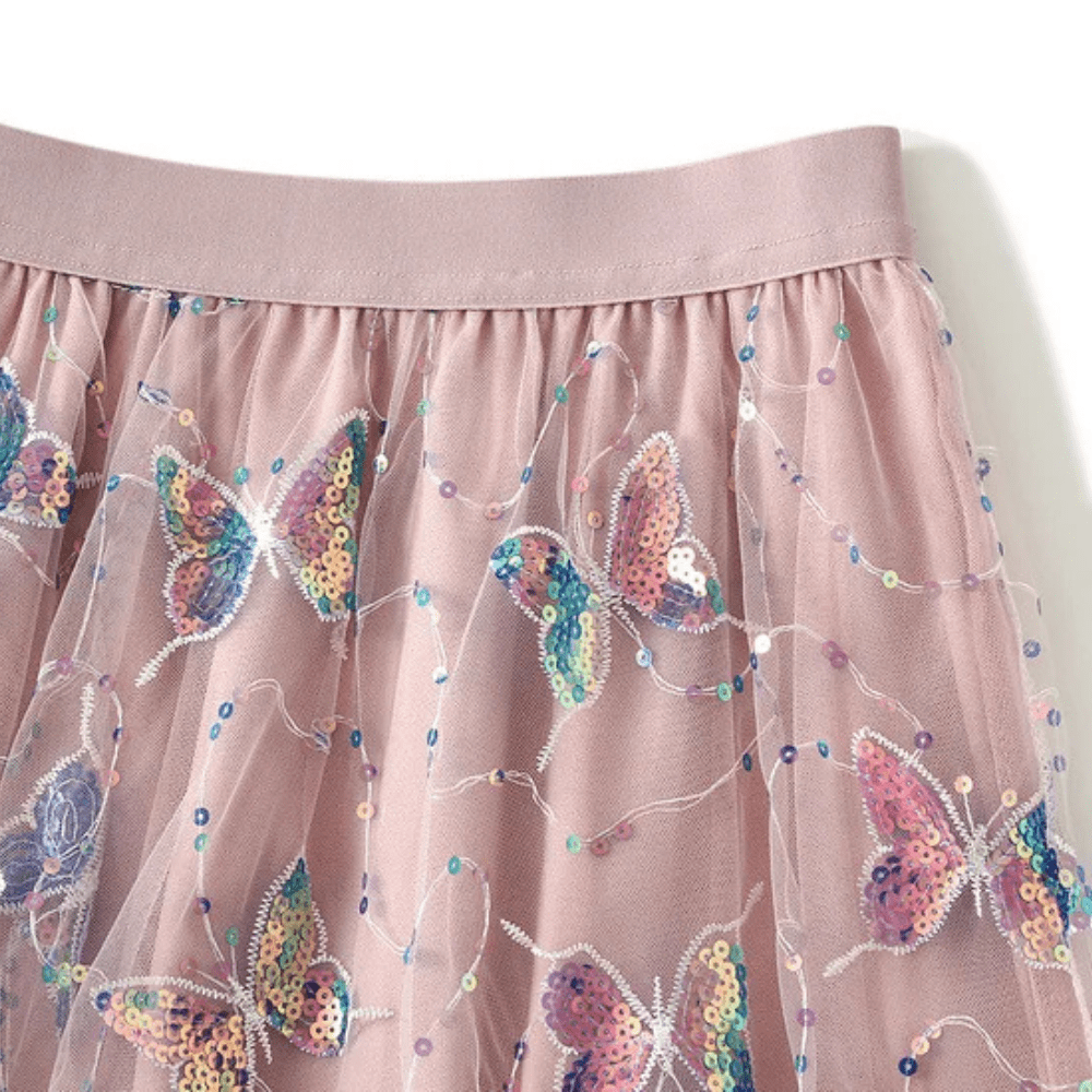 Tyllkjol med glittrande fjärilar